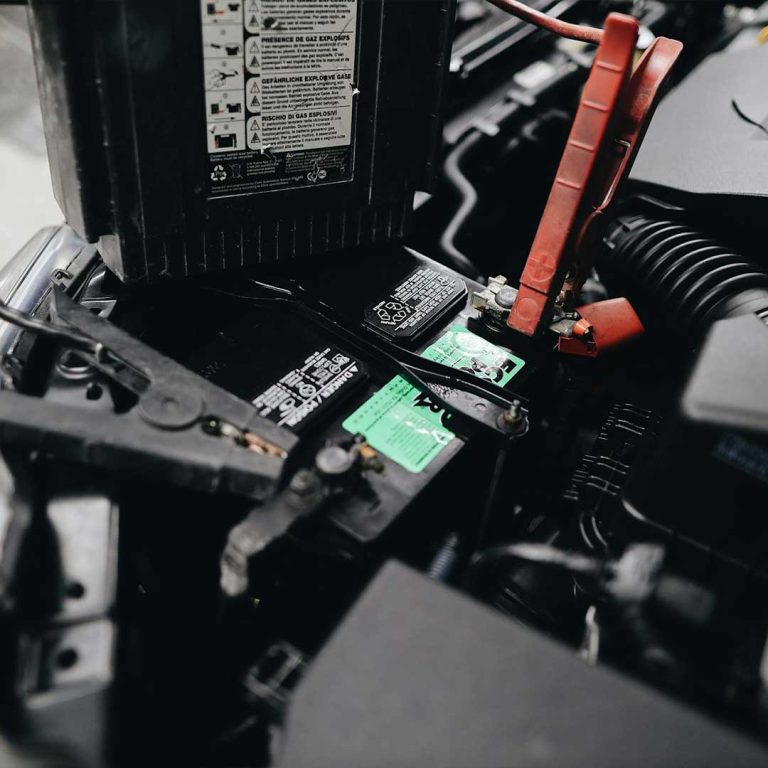 why do car batteries need servicing